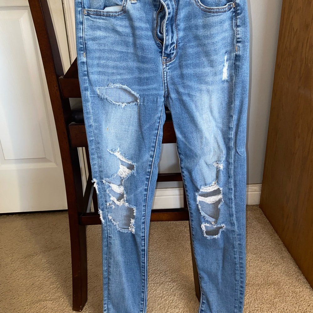 Distressed Blue Denim Jeans